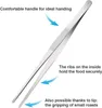 A pair of stainless steel kitchen tongs with descriptive text highlighting features. Produktbild-Vorschau