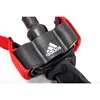 Close-up of a black fitness band with red straps and an Adidas logo. Produktbild-Vorschau