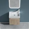 A modern bathroom vanity with a sink and faucet, set against a blue wall and gray floor. Produktbild-Vorschau
