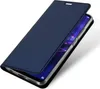 A dark blue flip case for a smartphone is shown from a diagonal angle, with the cover slightly open to reveal the phone screen. Produktbild-Vorschau