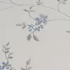 A close-up view of wallpaper with a floral pattern. Produktbild-Vorschau