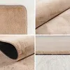 A collage of four close-up images showing the texture and details of a beige rug. Podgląd zdjęcia produktu