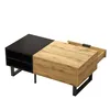A modern coffee table with a color-block design, featuring a black section with shelves and a wood-tone section with a pull-out drawer. The table has black metal legs. Produktbild-Vorschau