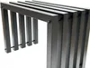 A close-up, angled view of a black metal bench with a slatted design, set against a white background. Produktbild-Vorschau