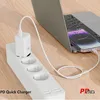 A white power strip with a white charger plugged in, connected to a laptop and a smartphone. Produktbild-Vorschau