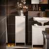 A modern bathroom with dark tiled walls and white storage units. Produktbild-Vorschau