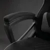 A close-up view of the armrest and part of the backrest of a black and gray gaming chair. Anteprima dell’immagine prodotto
