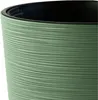 A close-up view of the textured exterior of a green plant pot with a black interior. Produktbild-Vorschau
