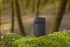 A small black leather case with a chain is placed on a moss-covered rock in a forest. Náhled obrázku produktu