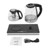 A tea tray kettle set including a kettle, a teapot with infuser, a heating base, an instruction manual, and a power cord, displayed on a white background. Podgląd zdjęcia produktu