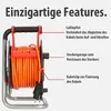 A close-up view of an orange cable reel with labels pointing out its features. Produktbild-Vorschau