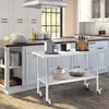 A kitchen scene with a stainless steel rolling cart displaying kitchen appliances and cookware. The cart is placed in front of a kitchen island and cabinets. Náhľad obrázku produktu