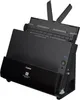 A black Canon imageFORMULA DR-C225II scanner is shown from a slightly elevated diagonal angle against a white background. The scanner's lid is open, revealing the paper feed mechanism. The Canon logo and product name are visible on the front of the device. Voir les images du produit