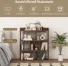 A bookshelf with various items on it, next to a bed and a plant. Produktbild-Vorschau
