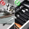 A split image showing a disorganized drawer of cutlery on the left with a red 'X' and an organized cutlery drawer insert on the right with a green checkmark. Produktbild-Vorschau