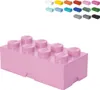 A pink LEGO storage brick with 8 studs on top, shown against a white background. Several other LEGO bricks of various colors are visible in the upper right corner of the image. Voir les images du produit