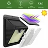 A solar-powered wall light with a motion sensor, shown with diagrams illustrating its features. Voir les images du produit