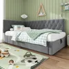 A child's bedroom with a corner daybed, rug, and toys. Náhľad obrázku produktu