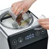 A person is adding chocolate shavings to an ice cream maker. Produktbild-Vorschau