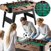A family playing foosball. Náhľad obrázku produktu