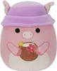 A plush toy pig wearing a purple hat and holding a coconut drink. Podgląd zdjęcia produktu