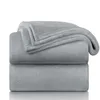 Two folded gray fleece blankets are stacked on top of each other against a white background. Produktbild-Vorschau