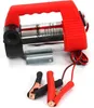 A red and silver 12V oil pump with black and red alligator clips attached to wires. Náhled obrázku produktu