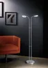 A modern living room with an orange armchair and a silver floor lamp with two lights. Produktbild-Vorschau