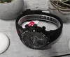 A close-up of a black Timex watch with a red accent on a wooden surface, with decorative pots in the background. Podgląd zdjęcia produktu