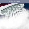 Close-up of an iron emitting a powerful stream of steam. Voir les images du produit