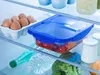 Inside a refrigerator, showing various food items and containers on shelves. Anteprima dell’immagine prodotto