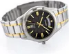 A close-up studio shot of a men's Casio watch with a black dial and a two-tone metal bracelet. Podgląd zdjęcia produktu
