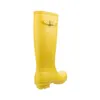 A yellow rubber boot shown from the side. Produktbild-Vorschau