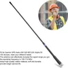 A handheld antenna is shown in the foreground, with a blurred image of a construction worker using a radio in the background. Podgląd zdjęcia produktu