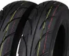 Close-up view of two black tires with red and yellow stripes. Anteprima dell’immagine prodotto