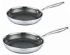 Two stainless steel frying pans with honeycomb pattern on a white background. Produktbild-Vorschau