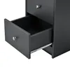 A close-up view of a dark gray desk drawer, partially open, showing the drawer slides. Podgląd zdjęcia produktu