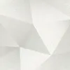 A close-up, abstract geometric pattern with a textured surface. Produktbild-Vorschau