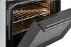 Close-up view of an open oven with racks inside. Produktbild-Vorschau
