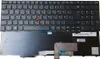 A black laptop keyboard with a red trackpoint. Produktbild-Vorschau