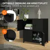 A black metal cabinet with four doors, shown in a home or office setting with decorative items. Náhled obrázku produktu