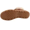 The image shows the sole of a brown Skechers boot with white fur trim. Produktbild-Vorschau