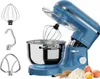 A blue stand mixer with various attachments displayed next to it, along with some baking ingredients. Produktbild-Vorschau