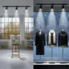 A split image showing an art studio on the left and a retail window display on the right. Produktbild-Vorschau