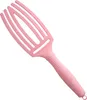 A pink hairbrush with a unique finger-like design is shown against a white background. Náhled obrázku produktu