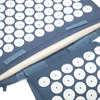 A close-up view of an acupressure mat and pillow set. Produktbild-Vorschau