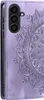 A close-up view of a purple phone case with a mandala design. Produktbild-Vorschau