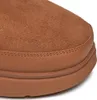 A close-up view of the toe and sole of a brown boot. Voir les images du produit