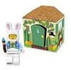 A LEGO minifigure dressed as a bunny is shown next to a small LEGO house. Produktbild-Vorschau