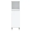 A white cabinet with an open top shelf and a closed bottom section, standing on four legs. Produktbild-Vorschau